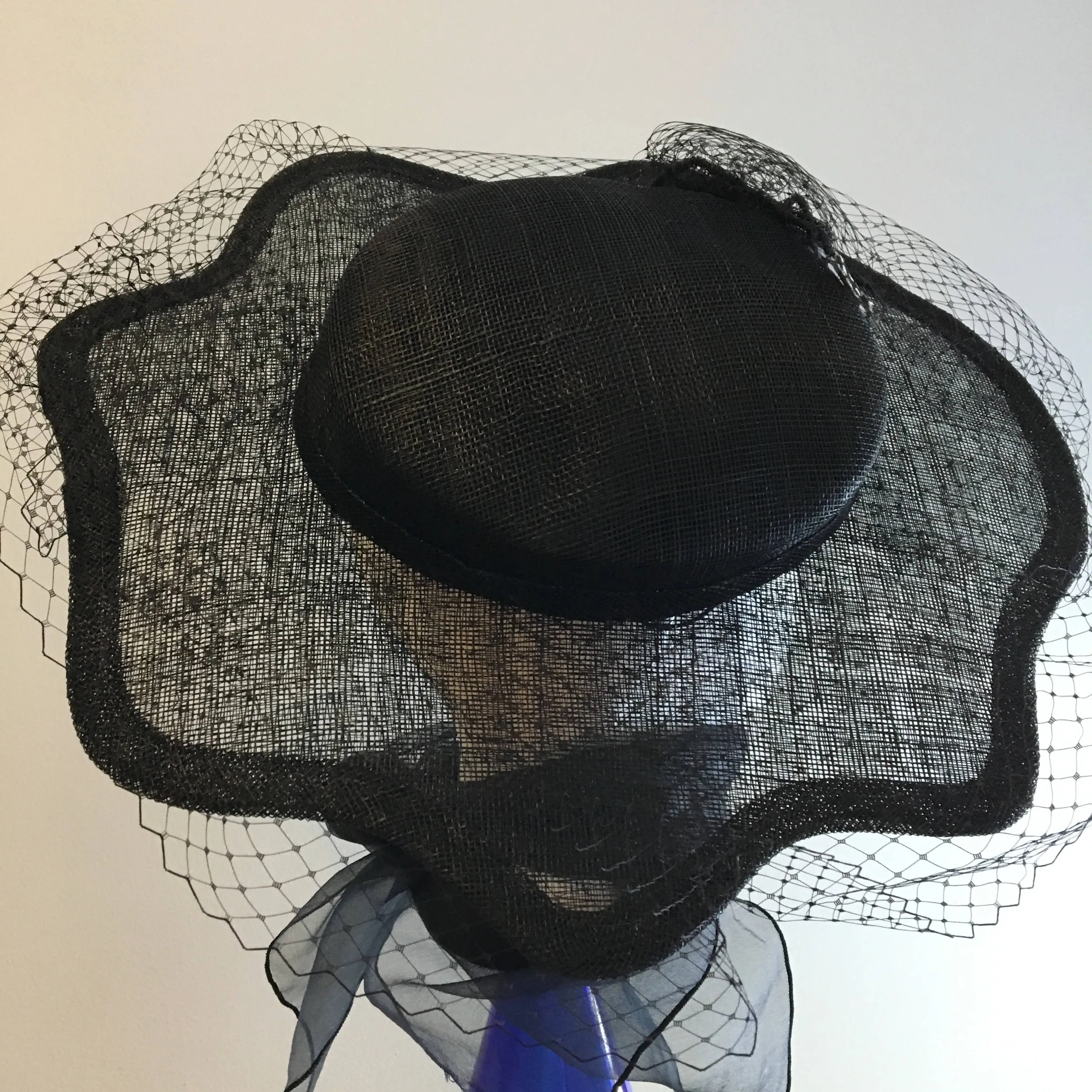Classic black hat-like fascinator, with scalloped brim and all around veiling. Hatinator: formal occasion or race day, Ascot or luncheon "JUNE"